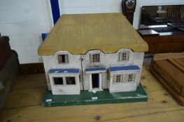 TEXTURED PLYWOOD DOLLS HOUSE WITH SIMULATED THATCHED ROOF, 76CM WIDE
