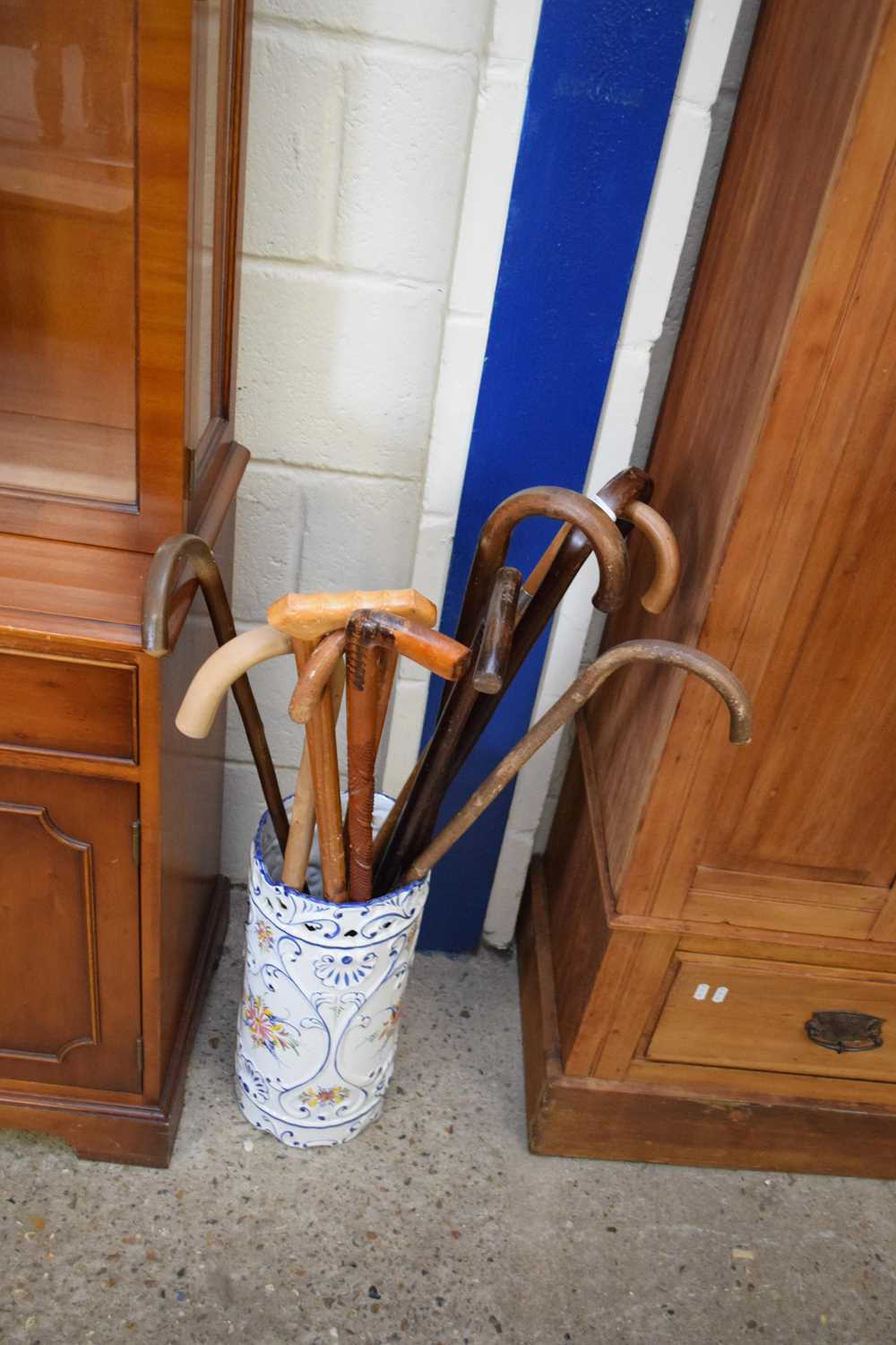 STICK STAND CONTAINING A RANGE OF WALKING STICKS