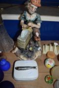 CAPO DI MONTE FIGURE AND A SARDINE DISH