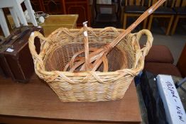 WICKER LAUNDRY BASKET, TWO FURTHER BASKETS AND A CARPET BEATER (4)