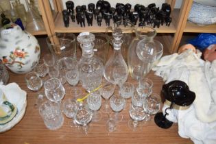 VARIOUS GLASS WARES TO INCLUDE DECANTERS, DRINKING GLASSES, ETC