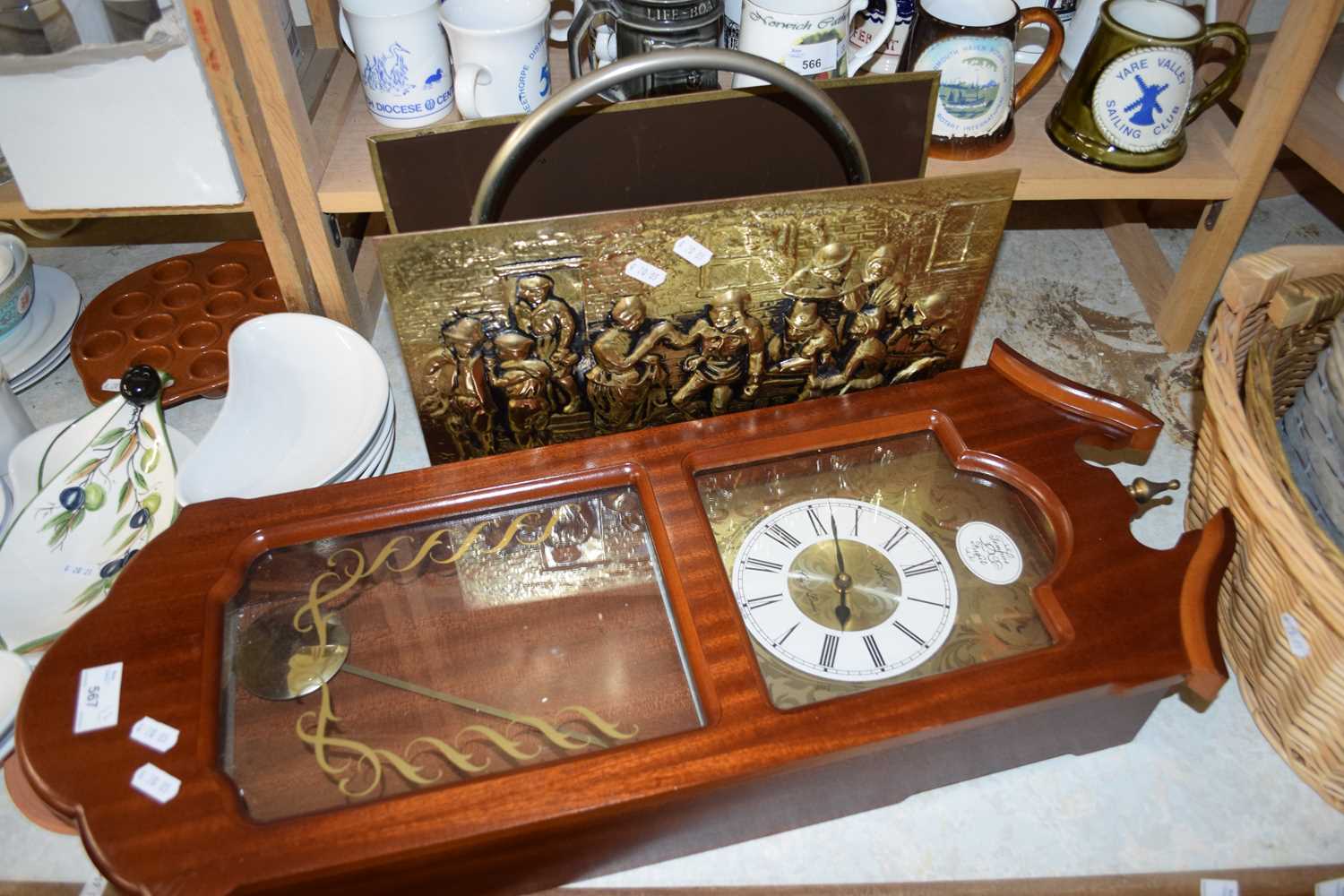 MODERN WALL CLOCK AND A BRASS MAGAZINE RACK (2)