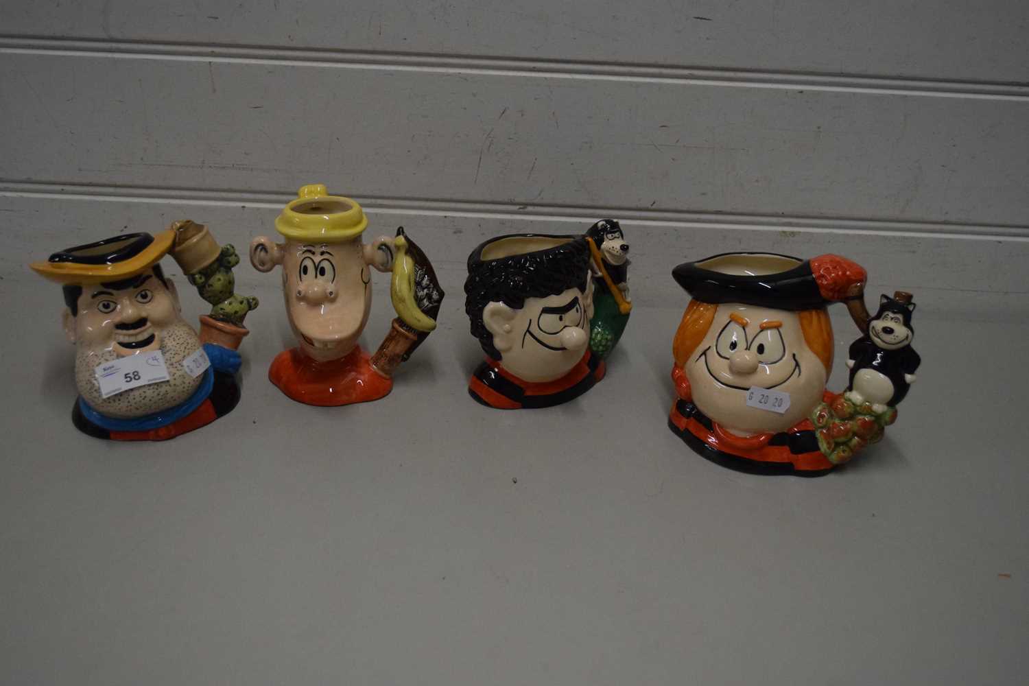 FOUR ROYAL DOULTON CHARACTER JUGS 'DESPERATE DAN', 'PLUG', 'DENNIS AND GNASHER' AND 'MINI THE