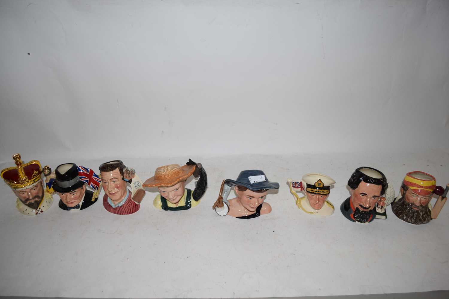 EIGHT SMALL ROYAL DOULTON CHARACTER JUGS TO INCLUDE EARL MOUNTBATTEN OF BURMA, HUCKLEBERRY FINN, W G