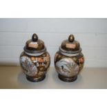 PAIR OF MODERN ORIENTAL COVERED JARS DECORATED WITH BIRDS