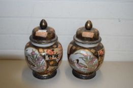 PAIR OF MODERN ORIENTAL COVERED JARS DECORATED WITH BIRDS