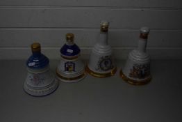 FOUR VARIOUS WADE BELLS SCOTCH WHISKY DECANTERS CELEBRATING VARIOUS ROYAL EVENTS TO INCLUDE QUEEN'