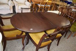 REPRODUCTION MAHOGANY TWIN PEDESTAL DINING TABLE AND SIX CHAIRS
