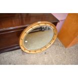 20TH CENTURY BEVELLED OVAL MIRROR, 59CM WIDE