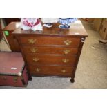 20TH CENTURY OAK FOUR DRAWER CHEST FITTED WITH BRASS HANDLES, THE SECOND DRAWER FITTED AS A