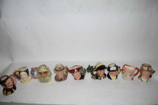 NINE SMALL CHARACTER JUGS TO INCLUDE THE AIR MAN, LONG JOHN SILVER, PRINCE ALBERT, LORD BADEN POWELL