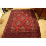 CONTEMPORARY WOOL FLOOR RUG DECORATED WITH LOZENGES ON A RED BACKGROUND, 200CM LONG