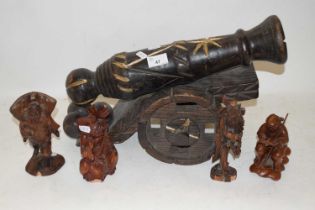 WOODEN MODEL CANNON TOGETHER WITH FOUR VARIOUS CHINESE WOODEN FIGURES (5)