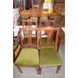 SET OF FOUR LATE 19TH OR EARLY 20TH CENTURY DINING CHAIRS WITH PIERCED BACKS