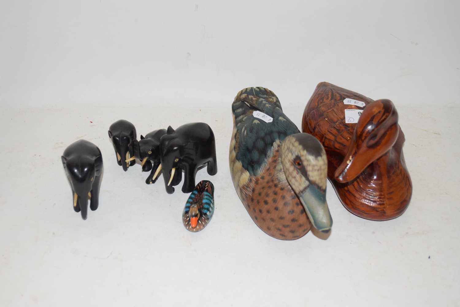 EBONY ELEPHANTS AND TWO WOODEN DUCKS