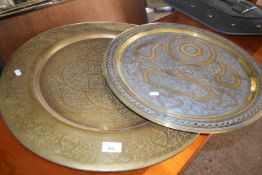 TWO MIDDLE EASTERN CIRCULAR BRASS TRAYS, LARGEST 58CM DIAM