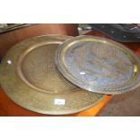 TWO MIDDLE EASTERN CIRCULAR BRASS TRAYS, LARGEST 58CM DIAM