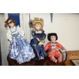 THREE MODERN PORCELAIN HEADED DOLLS