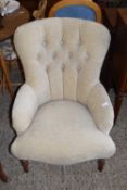 BEIGE UPHOLSTERED BUTTON BACK ARMCHAIR