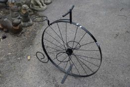 Plant stand in the shape of a penny farthing, height approx 75cm