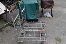 Two metal trolleys