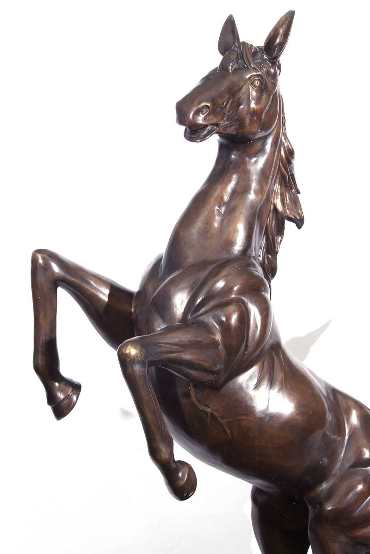A contemporary bronzed metal model of a rearing horse set on a naturalistic base, 180cm high - Image 2 of 2