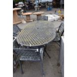 Cast garden dining set comprising table and four chairs, table width 106cm x 180cm