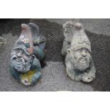 Pair of composite garden gnomes, length approx 50cm, height approx 40cm