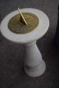 Composite stone pedestal with a brass sundial, height approx 65cm