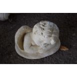 Composite garden statue formed as a cherub, height approx 18cm