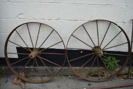 Pair of vintage iron wheels, total diam approx 90cm