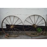 Pair of vintage iron wheels, total diam approx 90cm