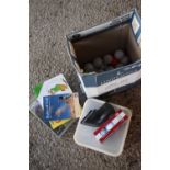 Box of golf balls, tees and further golf related items