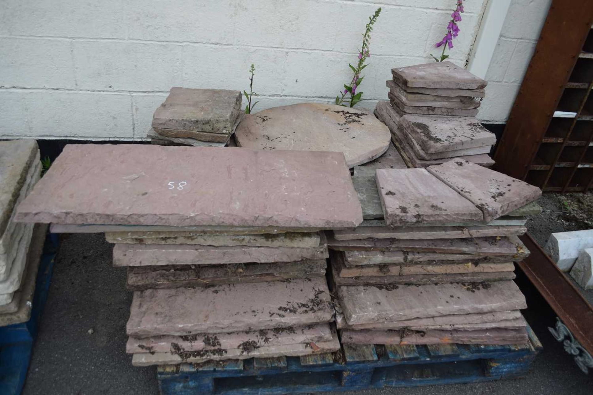 Large quantity of paving slabs to include a decorative circle