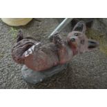 Composite garden ornament of a fox, width approx 40cm