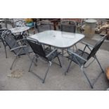 Metal garden dining set comprising table and five chairs