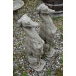 Pair of seated whippets, height approx 70cm