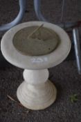 Brass sundial on a composite plinth, height approx 50cm