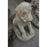 Composite garden statue in the shape of a seated dog, height 45cm