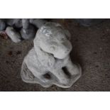 Composite garden statue formed as a dog, height approx 35cm