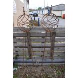 Pair of spiral ball topped obelisks, height 160cm