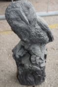 Composite garden statue of an owl sitting on a post, height 50cm