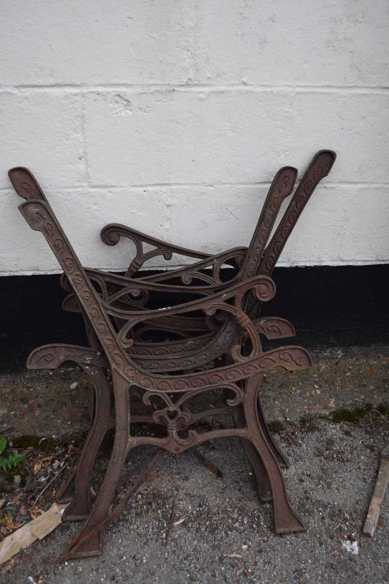 Two sets of cast iron bench ends