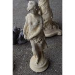 Composite garden statue of a lady with flowers, height 65cm