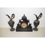 VICTORIAN BLACK SLATE MANTEL CLOCK TOGETHER WITH A PAIR OF SPELTER EWERS