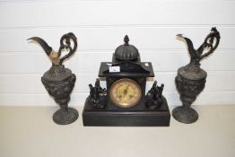 VICTORIAN BLACK SLATE MANTEL CLOCK TOGETHER WITH A PAIR OF SPELTER EWERS