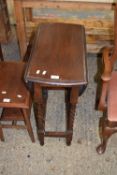 EARLY 20TH CENTURY OAK OVAL DROP LEAF TABLE ON BARLEY TWIST LEGS