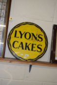 VINTAGE ENAMEL SIGN ADVERTISING 'LYONS CAKES', 43CM DIAM