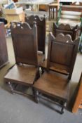 TWO PAIRS OF 18TH CENTURY STYLE OAK PANEL BACKED HARD SEATED CHAIRS