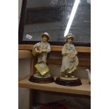 PAIR OF LIMITED EDITION FIGURES BY LEONARDO. DESIGNED BY LESSER AND PAVEY - GATHERING FRUIT 1988